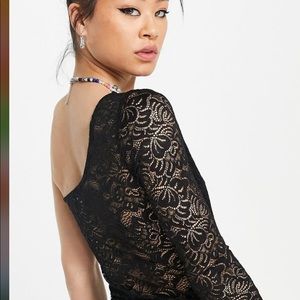 bodysuit with lace trim shows off one shoulder